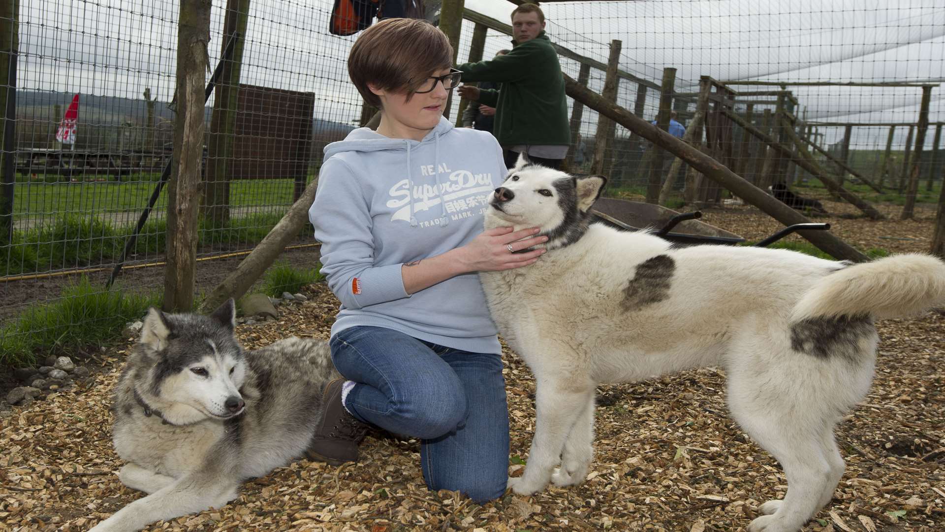 Volunteers with the centre's husky dogs
