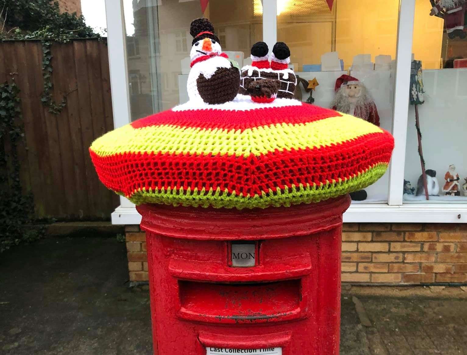 The knitted post box outside Minster-on-Sea sub post office