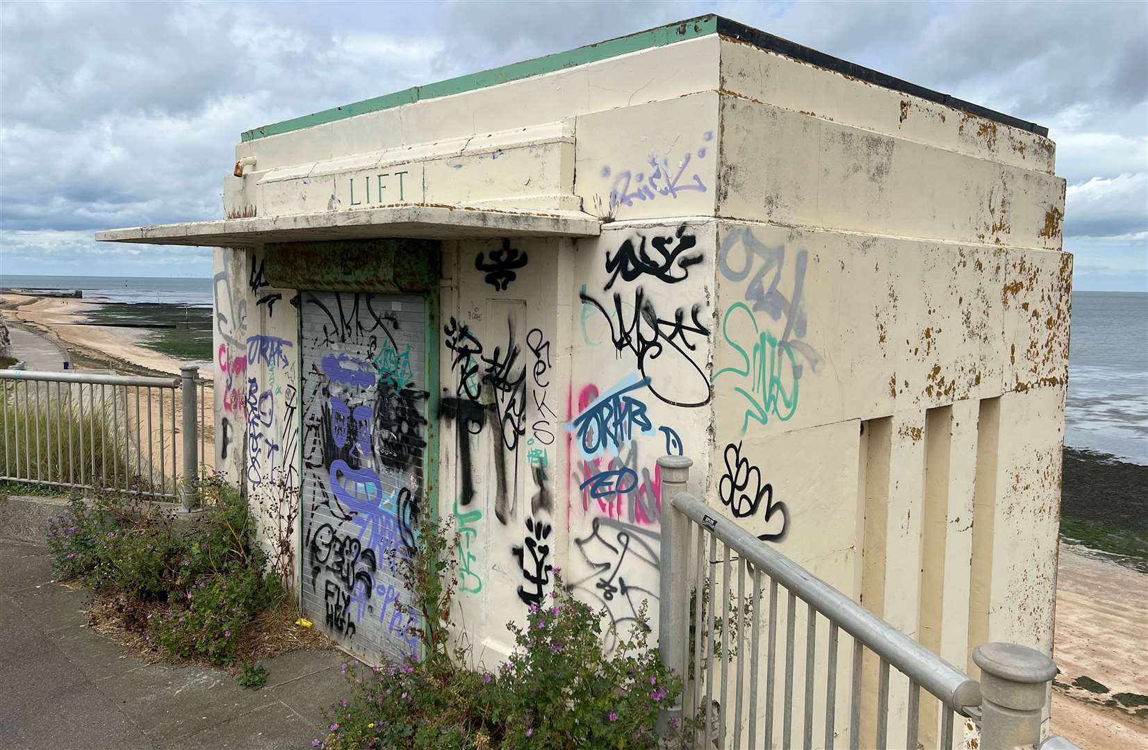 The cliff-top access to the art deco lift at Walpole Bay - long since left for weeds and graffiti