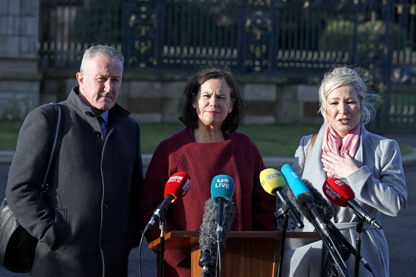 Sinn Fein representatives (left to right) MLA Conor Murphy, president Mary Lou McDonald and vice-president Michelle O’Neill speak to the media outside Hillsborough Castle (Liam McBurney/PA)