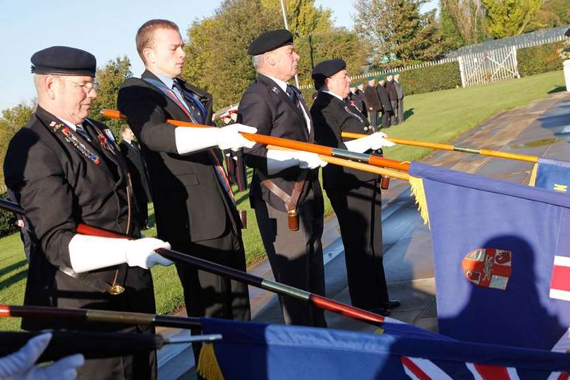 Standard bearers lower their flags at the Great Lines in Gillingham