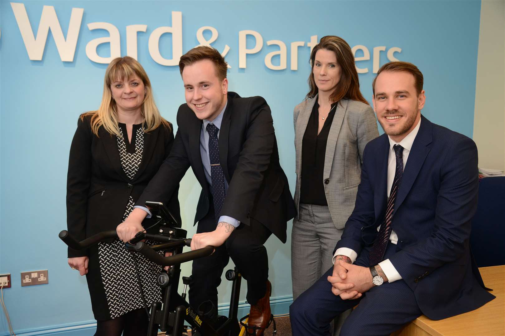 Amanda Robinson, Matt Amos, Nickie Phillipson and Manager Lee Wilson Taking part in the cycle around the world fundraiser Ward & Partners, Deal