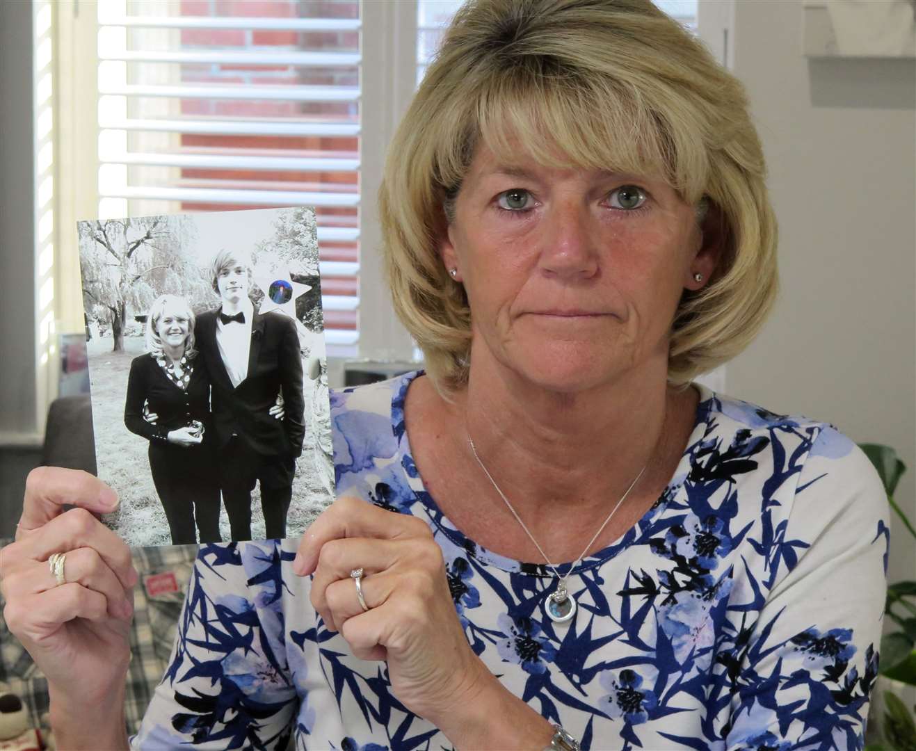 Jenny Woledge with a photo of her son William