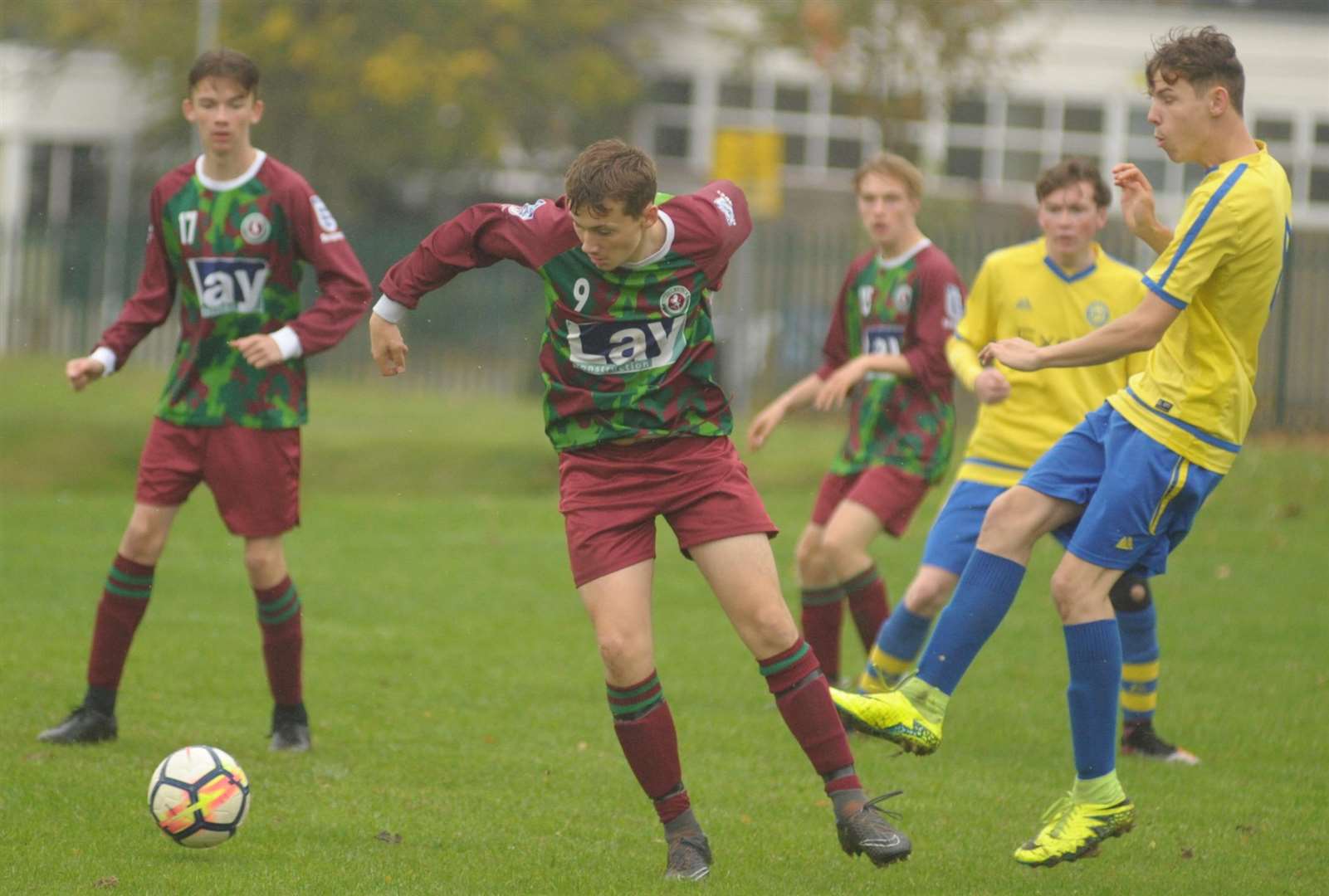 Strood 87 under-16s (yellow) and Cobham Colts went head-to-head in Division 1 Picture: Steve Crispe