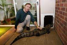 Chris Weller and his pet crocodile