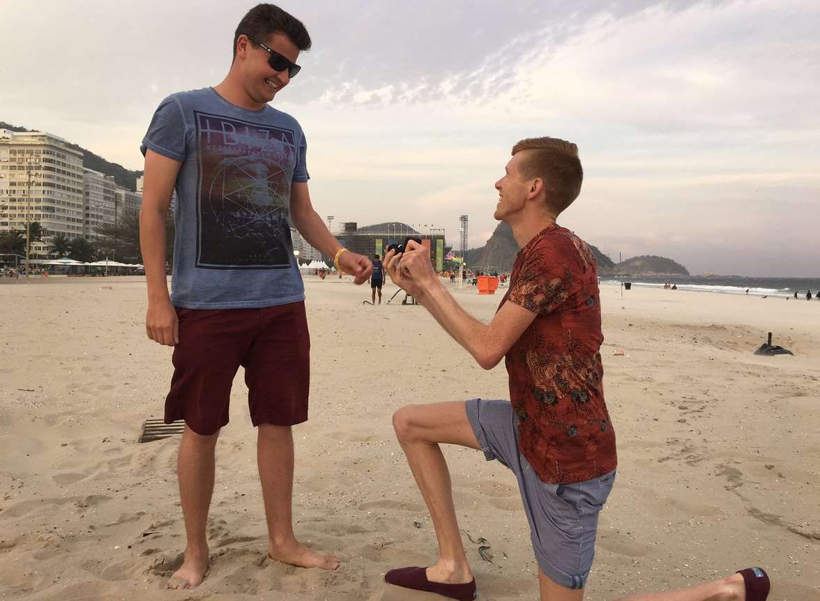 Tom proposes to Harry on a Rio beach. Picture: @TomBosworth