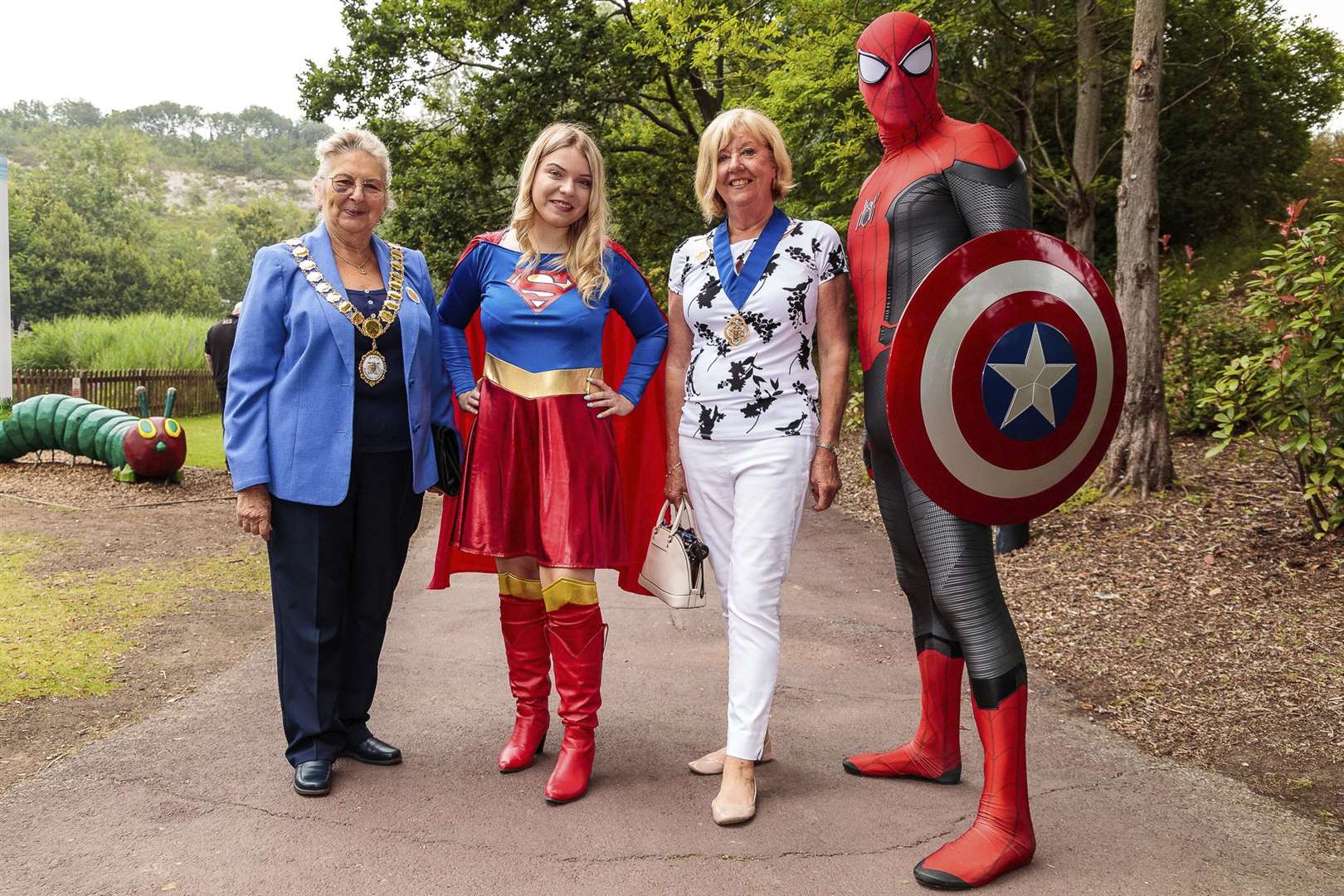 The Mayor of Dartford, Cllr Rosanna Currans, far left, and her envoy second from right, with Superwoman and Spiderman