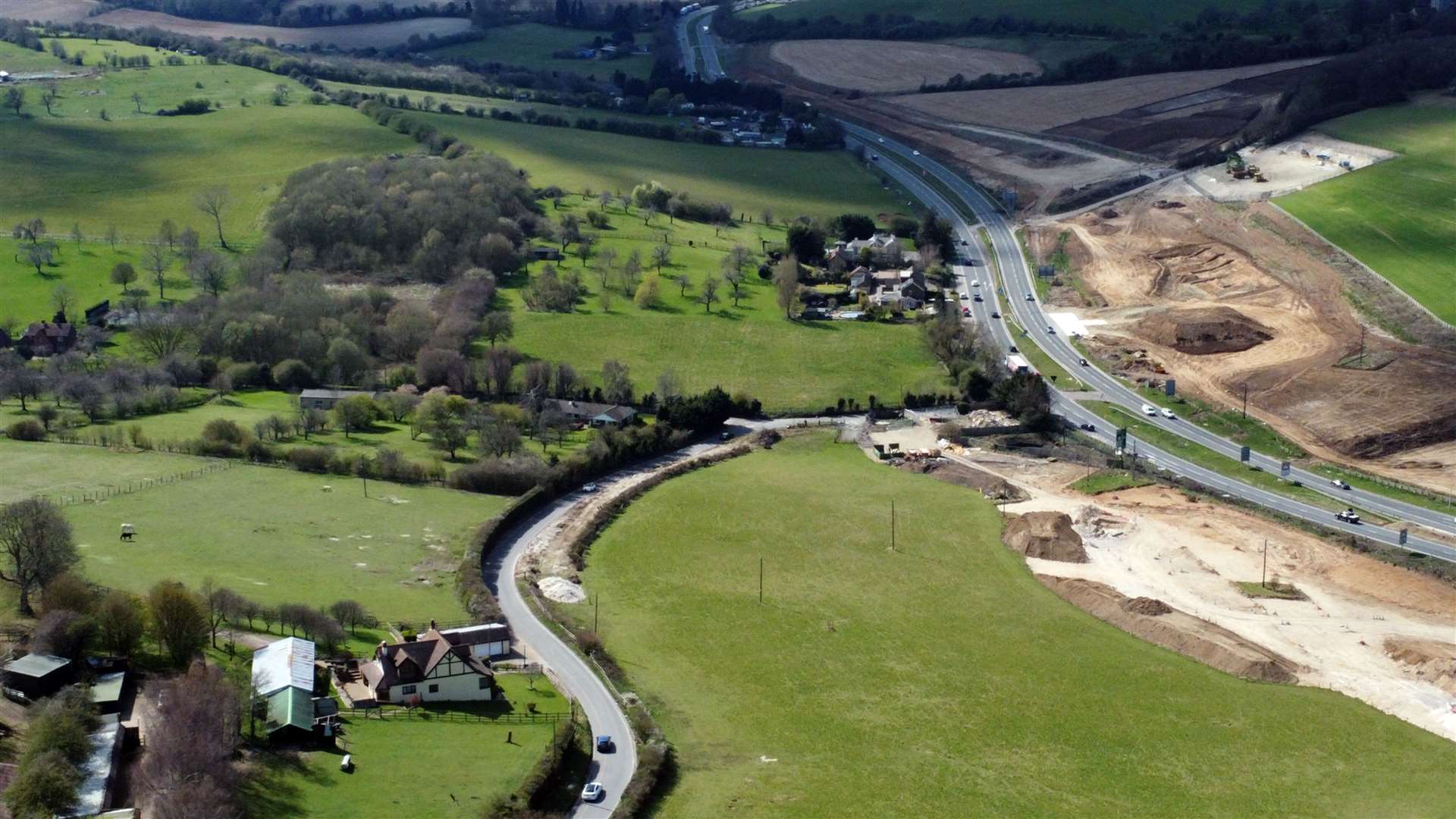The roundabout as it looked in April, pictured from above the M2 looking towards Maidstone