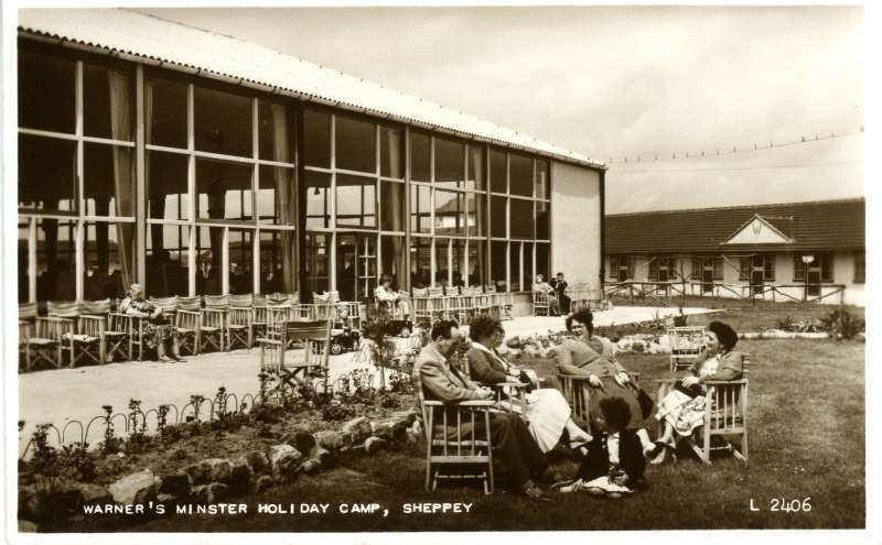 Relaxing outside Warners holiday camp at Minster, Sheppey