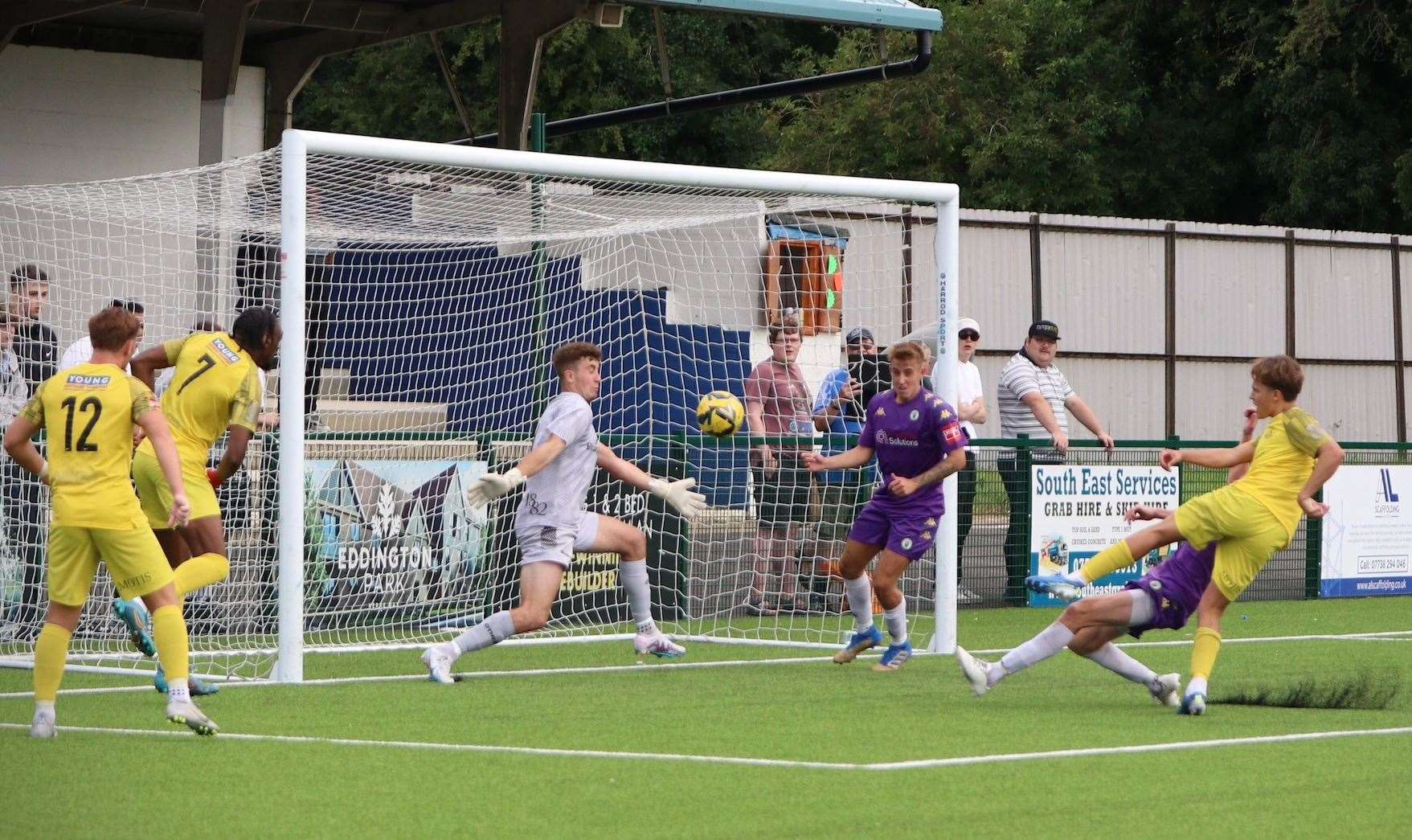 Archie Burnett blasts in Herne Bay's equaliser in their opening-day 2-2 draw at home to Burgess Hill on Saturday. Picture: James Aylward