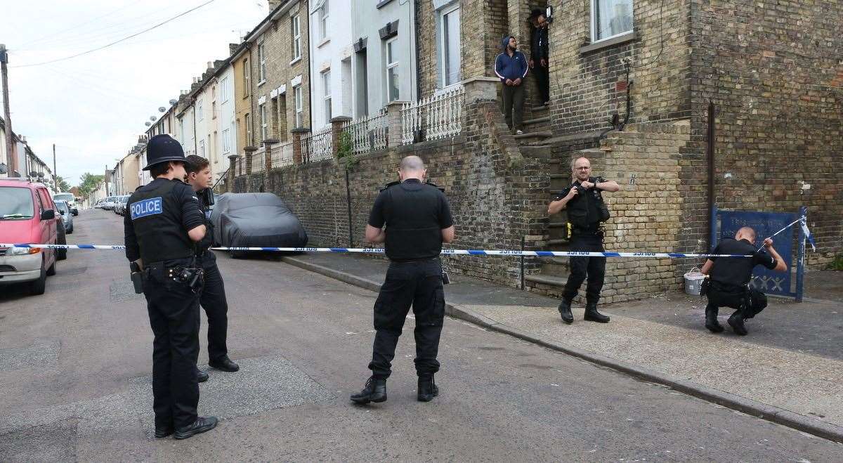 Investigation work takes place in Hartington Street after a man was stabbed. Picture: UKNiP