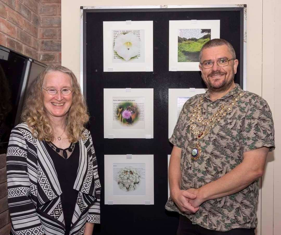 Kathy Roddy, pictured with Cllr Tim Prater, has opened an exhibition showing photos from the site. Photo: Mark Brophy