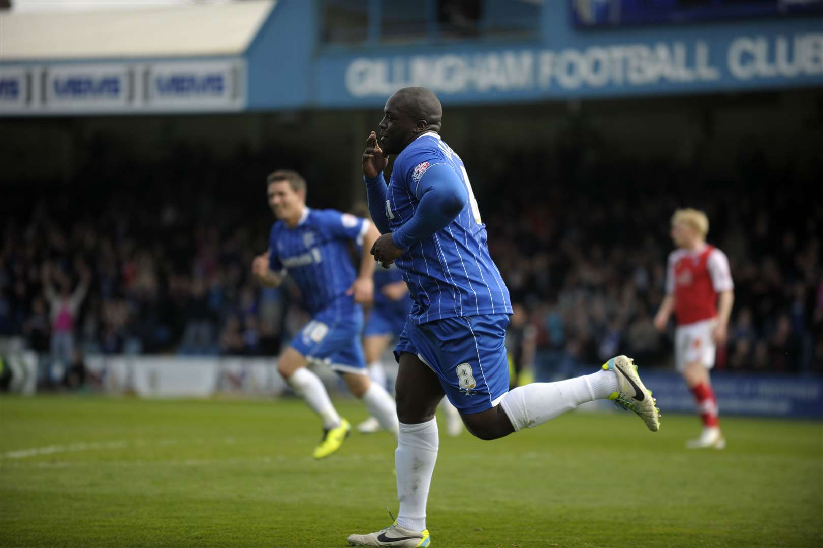 Bayo Akinfenwa celebrates a goal for Gillingham Picture: Barry Goodwin