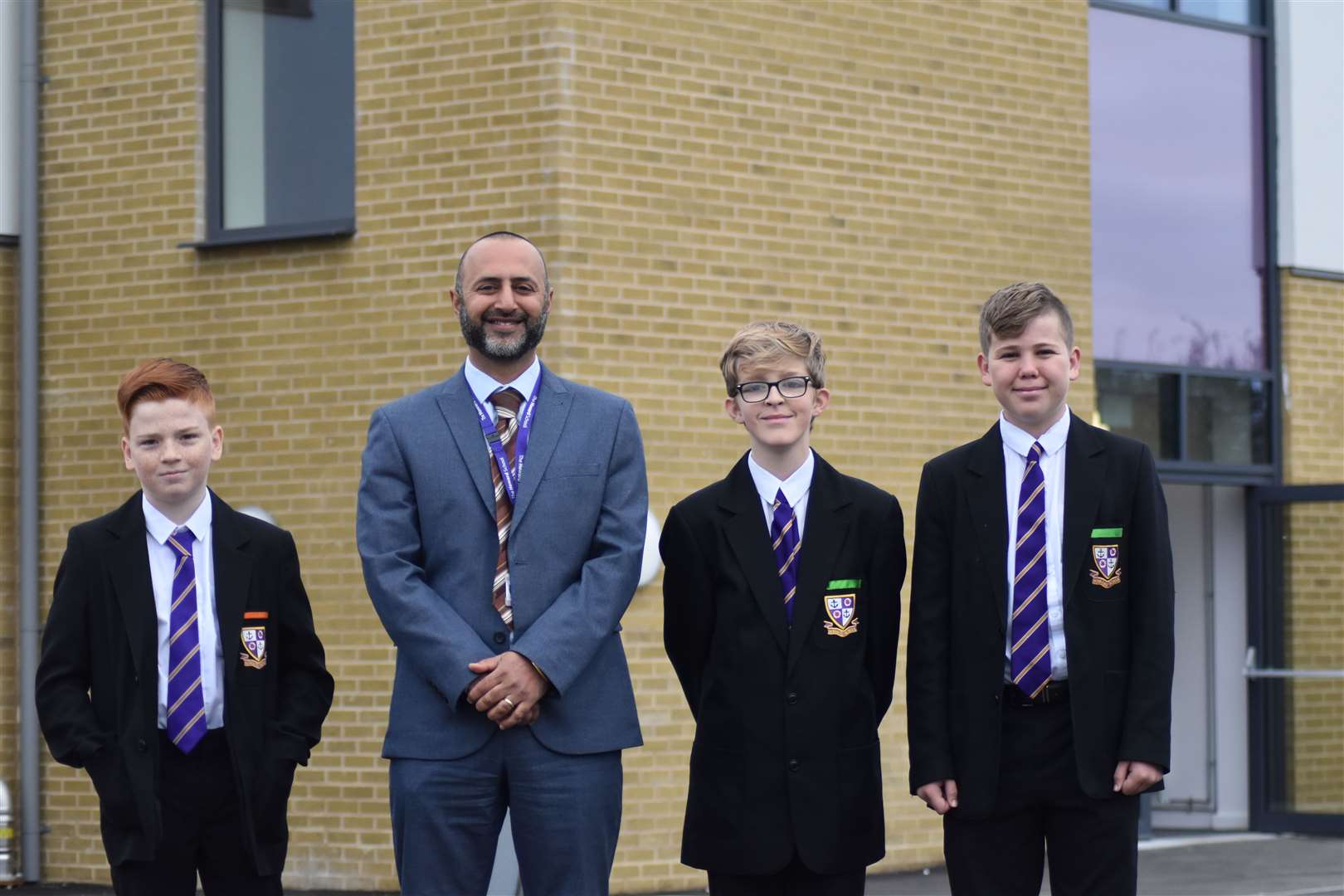 Head teacher Jasbinder Johal and pupils outside the new £5m science and design and technology block at the Howard School in Rainham. Picture: Howard School