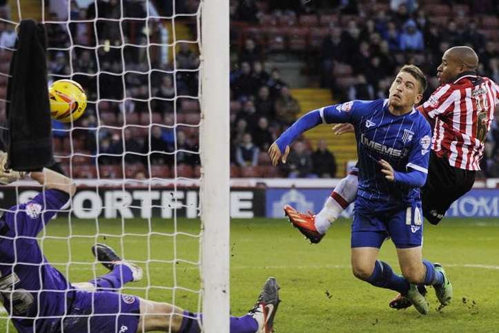 Cody McDonald scores Gills' second goal against Sheffield United on Saturday. Picture: Barry Goodwin