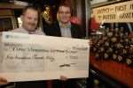 Aviator manager Phil Chislett presents Matt Ramsden with cheque