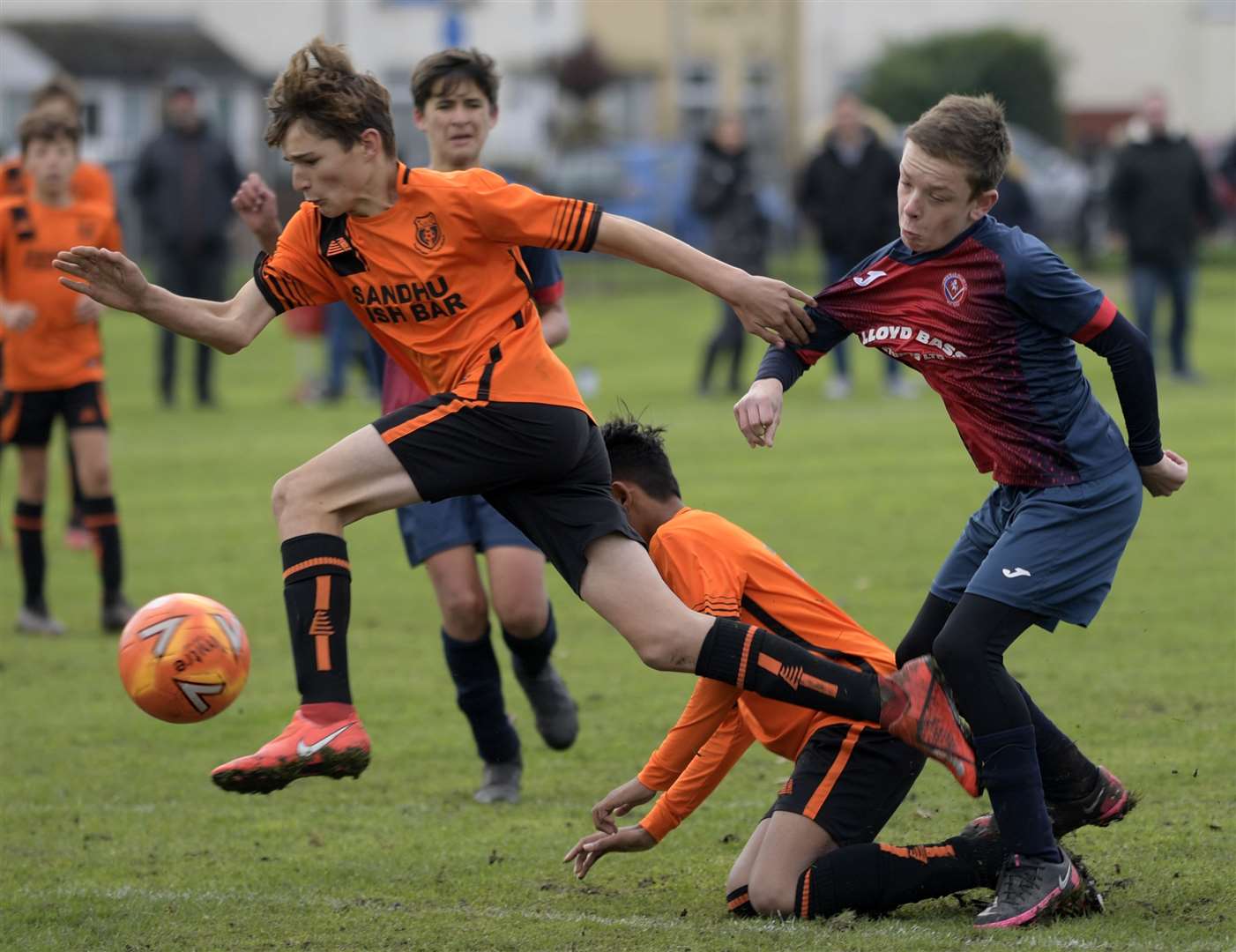 New Road Blues under-14s (orange) lead the charge against Hempstead Valley under-14s. Picture: Barry Goodwin (42745147)