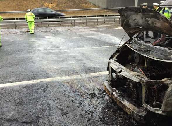 The burnt-out van on the carriageway. Picture: @kentopoliceroads