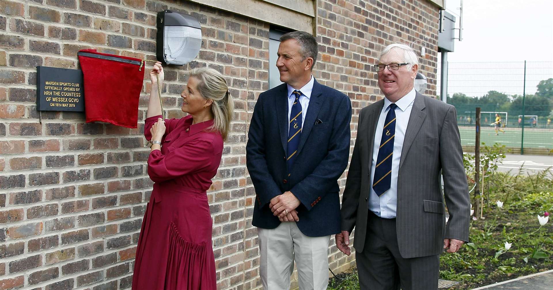 Sophie Countess of Wessex unveils the plaque watched by club president Frank Tipples and Clive Baxter