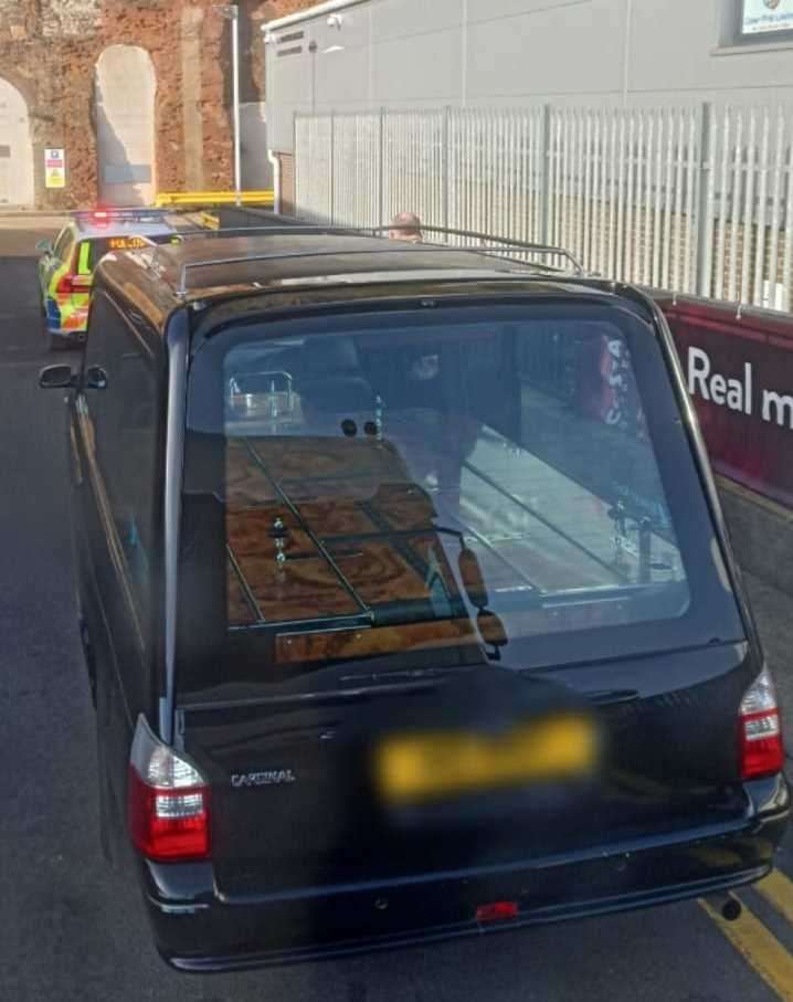 A hearse driver was caught on his phone while driving in Dover. Picture: Kent Police RPU