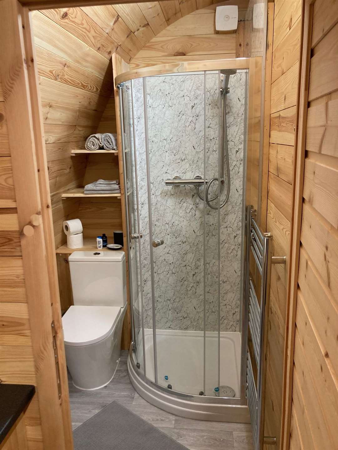 The surprisingly roomy shower inside a glamping pod at The Woolpack Inn in Yalding