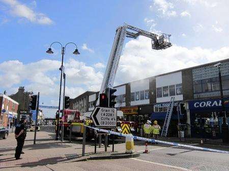 Firefighters tackle a blaze at Shu-Time in the High Street, Strood