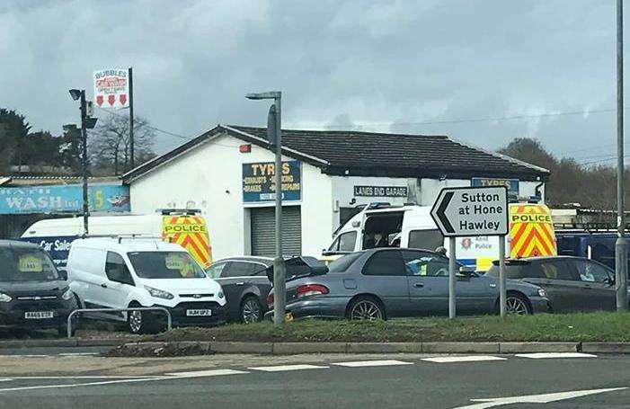 Two police vans were pictured at the car wash in Dartford