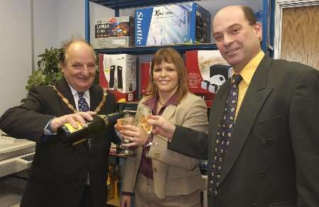 Tonbridge and Malling Mayor Derek Still celebrates with Fairline directors Linda and Gareth Sharpe. Picture: JIM BELL