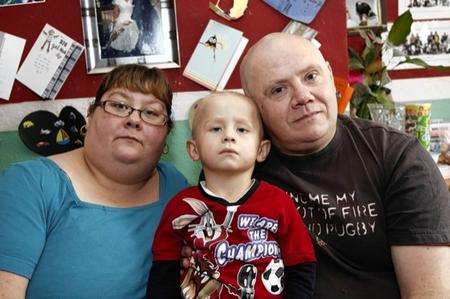 Two-year-old Aaron with parents Tracy and Mark Lindridge