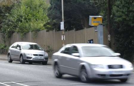 Cars pass the speed camera at St Martin's Hill, Canterbury