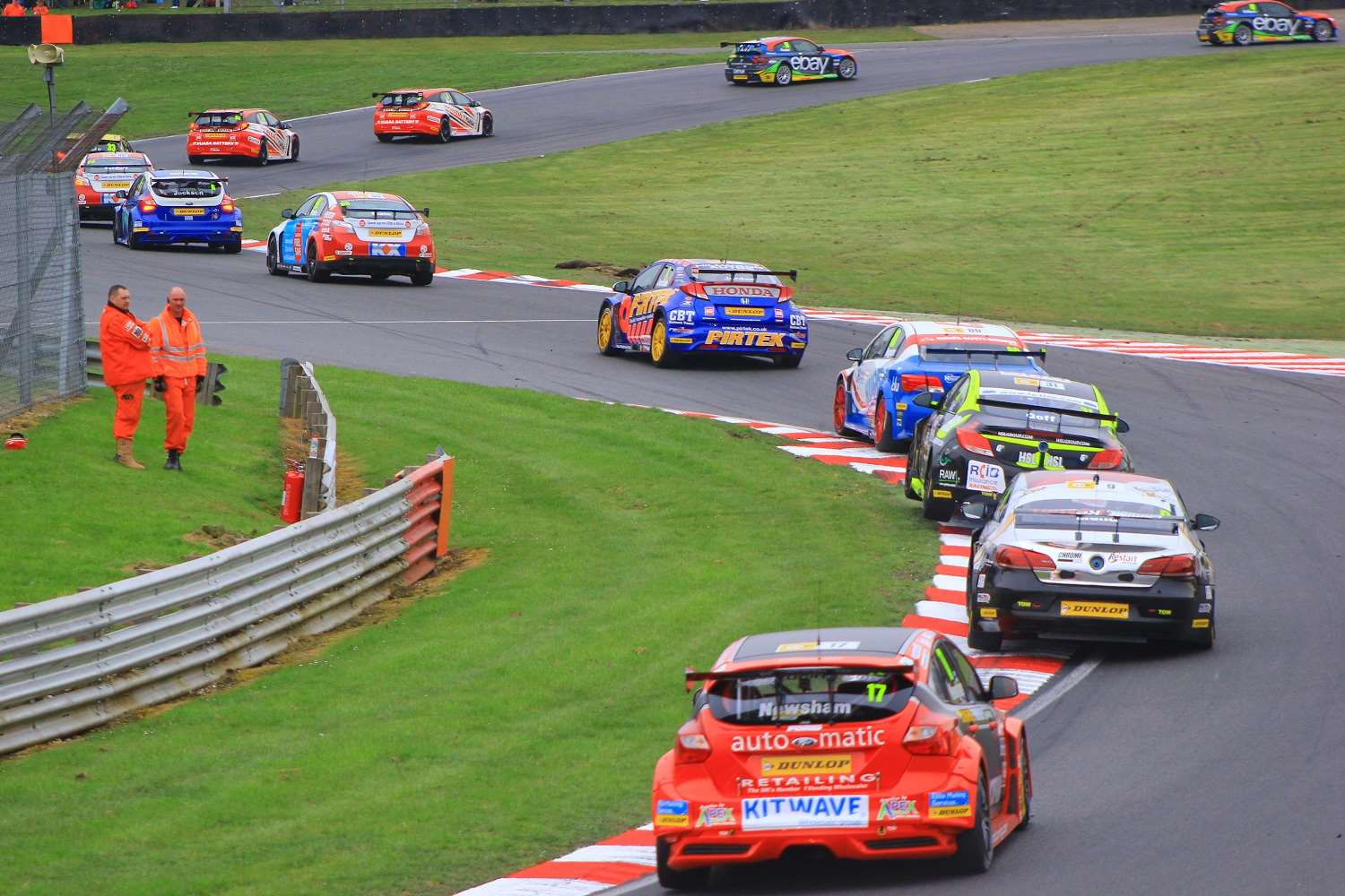 The strong BTCC field piles into Clearways. Picture - Joe Wright