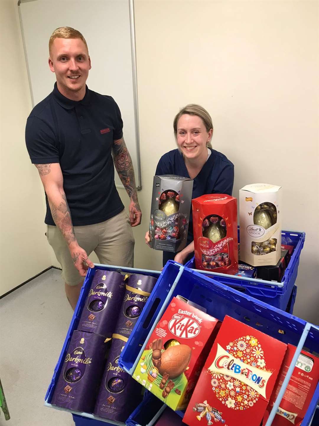 Aspiring Freemason Charlie Miller who gave £350 of Easter eggs to Katie Kimpton of the Intensive Care Unit at William Harvey Hospital in Ashford