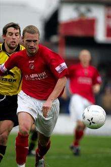 Andy Drury during his days playing for Gravesend and Northfleet is chased by a Burton Albion player