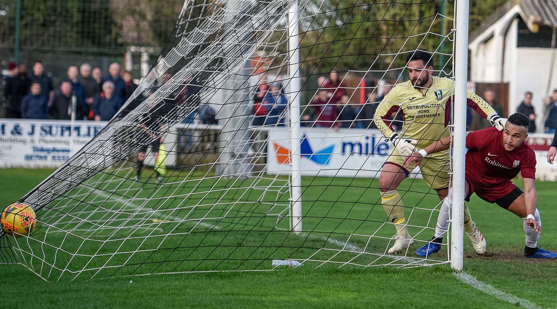 Cray Valley keeper Deren Ibrahim and City striker Dean Grant look on as Gary Sayer's spectacular acrobatic effort finds the net Picture: Alan Langley