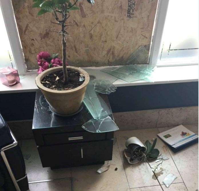 Smashed glass and plants pots. Picture: Michael Sheill (13398847)