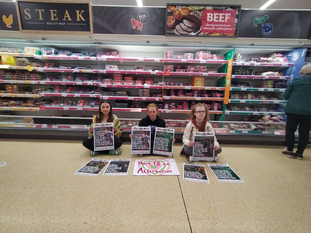 Three of the group in Sainsbury's, Canterbury. Picture: Animal Rebellion