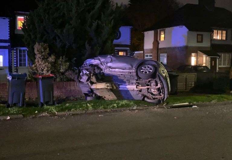 A car was seen overturned on the residential street