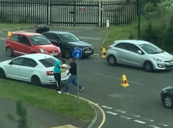 Road rage incident at The Bridge estate, Dartford. One man hits another man with a hammer.