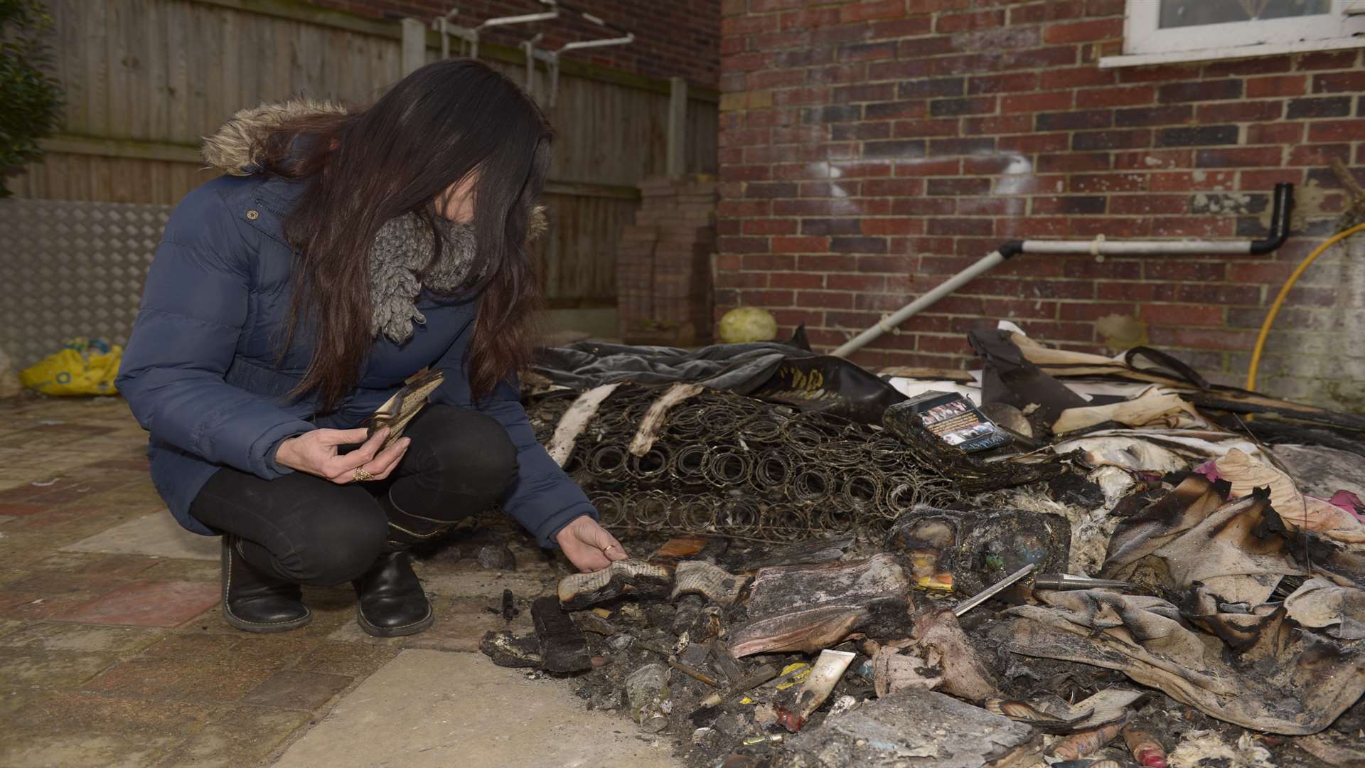 Jamie with items damaged in the fire at her Sturry home