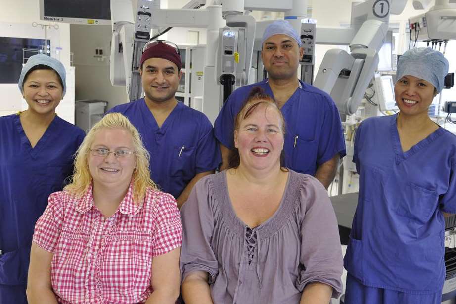 Mother Victoria Emmanuel, front left, and Susanne Moussa with the surgical team