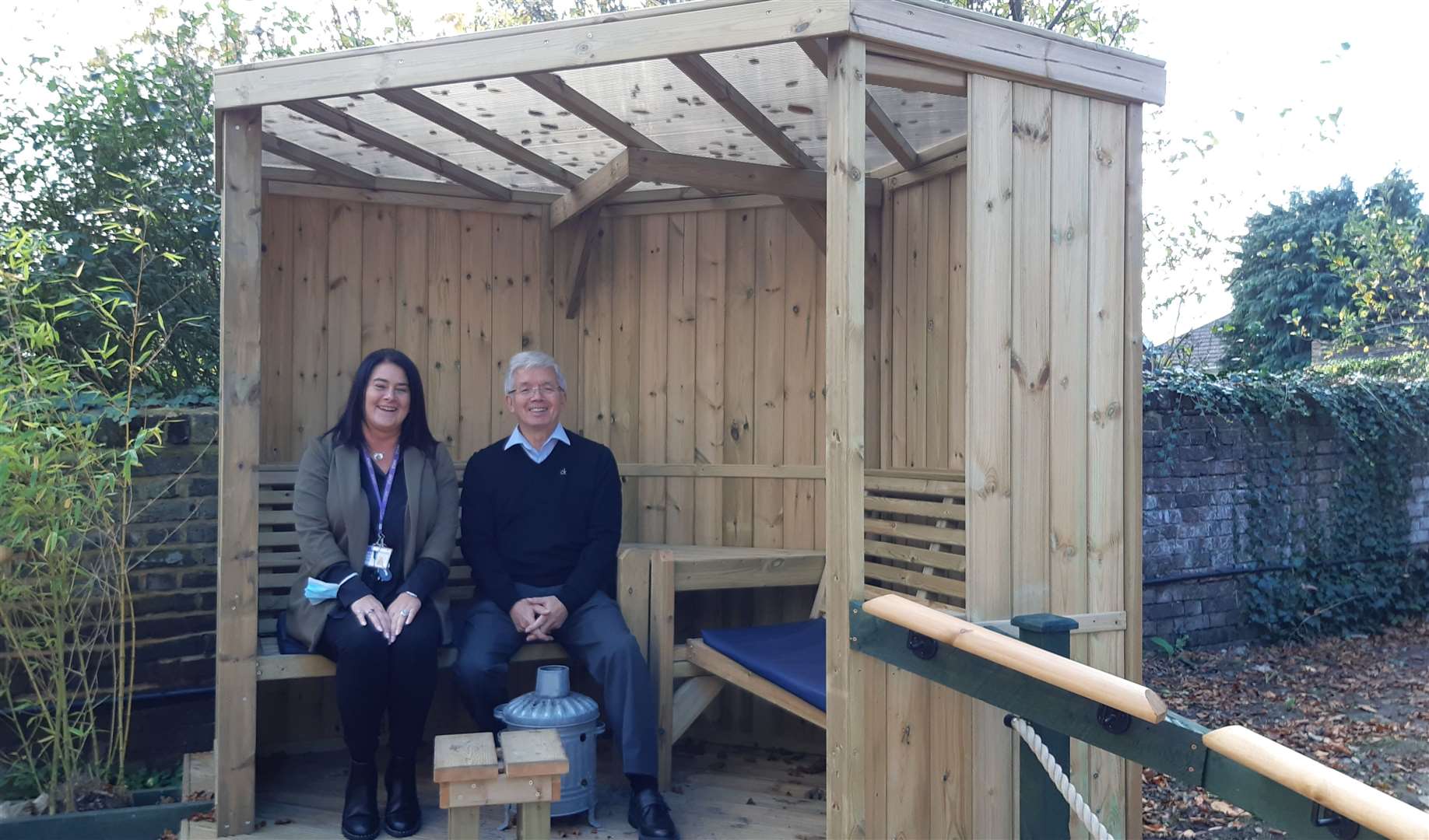 Tracy Maybank, assistant manager at Maidstone Day Centre, and Des Long, Homeless Care trustee, in the new open gazebo at Goodsell House (53895496)