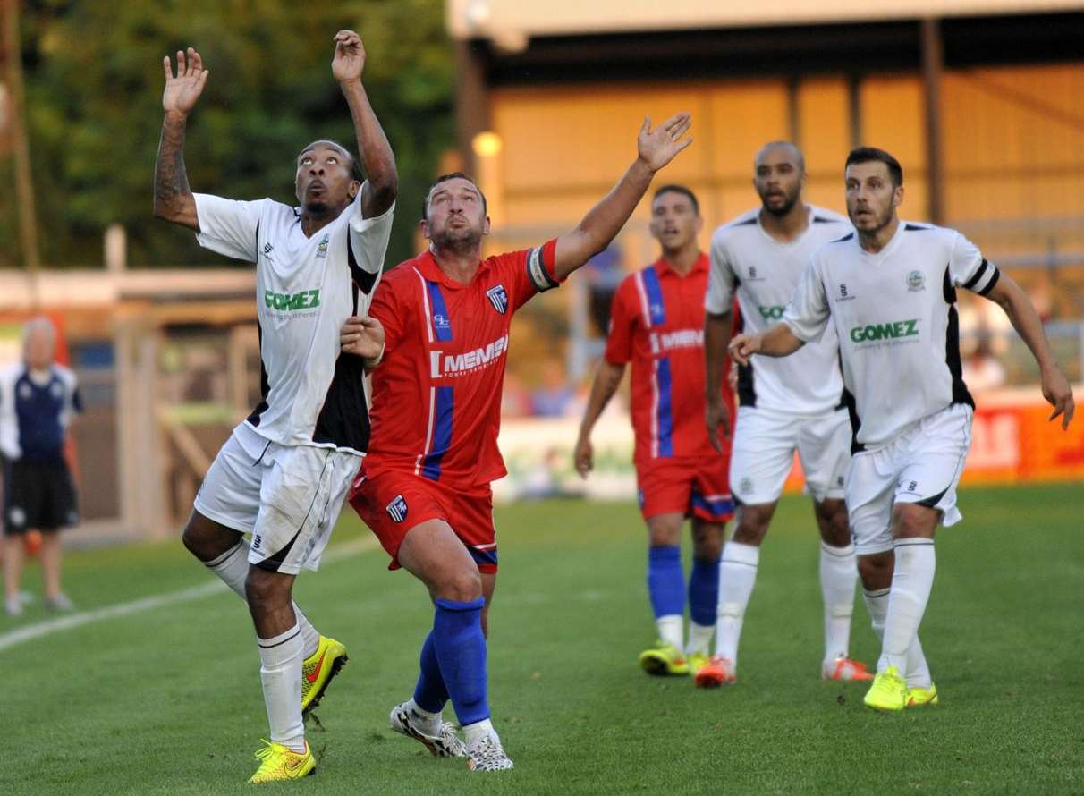 Danny Kedwell challenges Dover's Ricky Modeste during Gillingham's midweek friendly Picture: Tony Flashman
