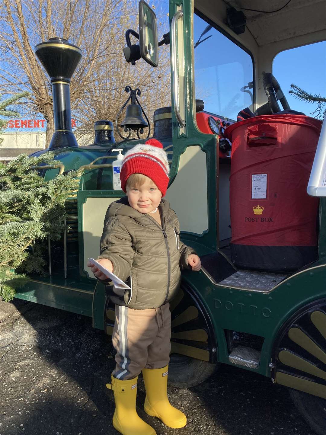 Little Carter Stevens, 3, of Minster, couldn't wait to post his letter to Santa on the special mail train parked in Beachfields