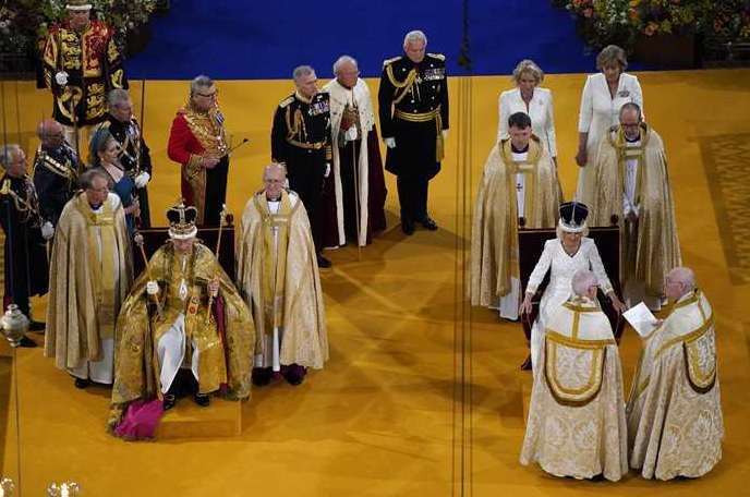 The King wearing St Edward’s Crown and Queen Camilla wearing Queen Mary’s Crown during their coronation ceremony (Andrew Matthews/PA)