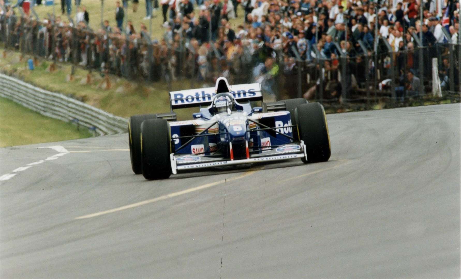 A big crowd filled the Brabham Straight banking as Hill took to the circuit