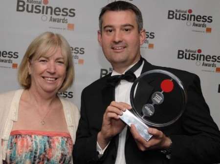 Andrew Lloyd, MD of MDA Searchflow receives his award from Sue Hill, City and Guilds sales and marketing director