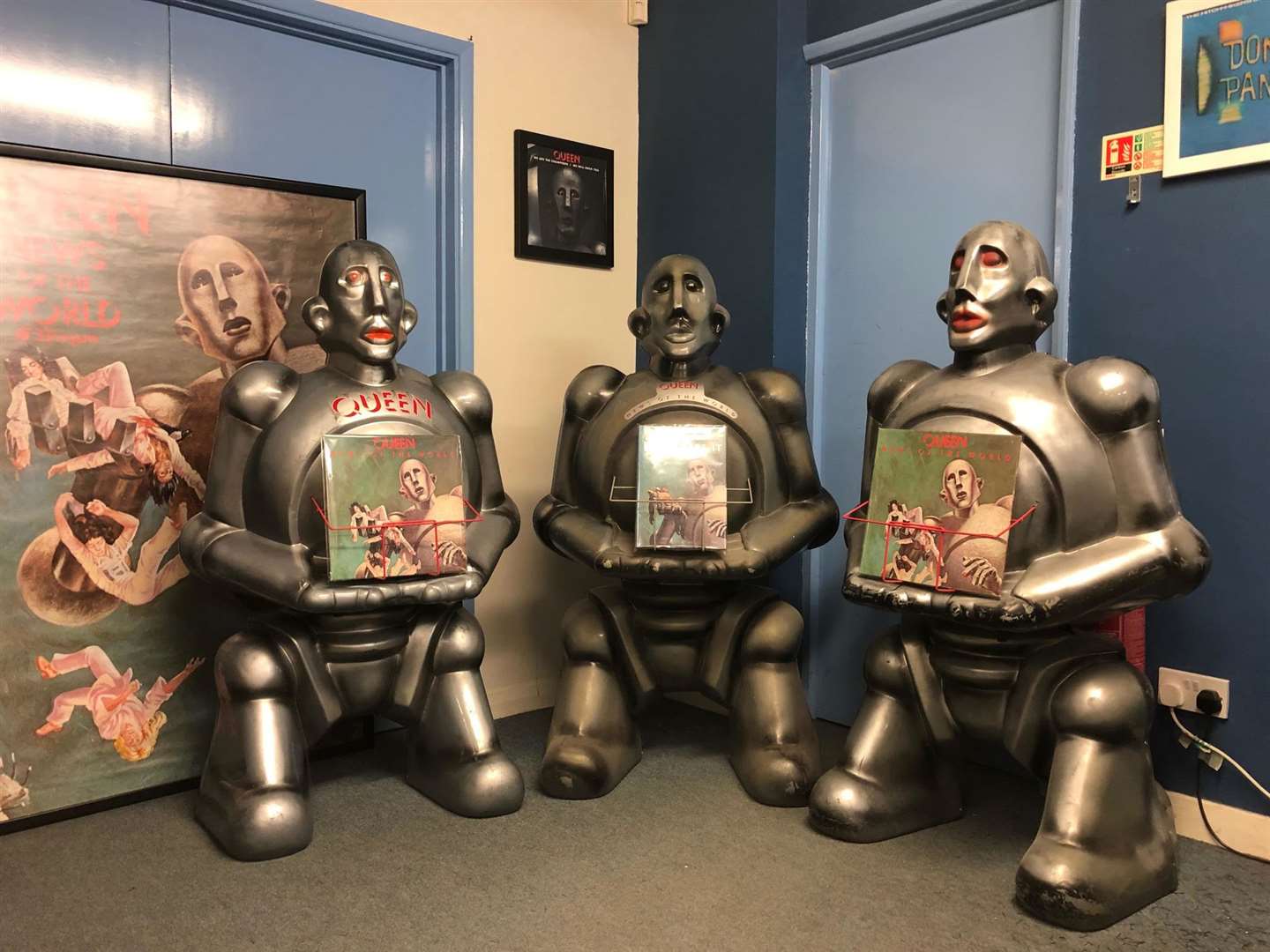 A trio of rare promotional robots for Queen's News Of The World album from 1977. Brian May has one as well. Picture Julian Thomas/EIL.com