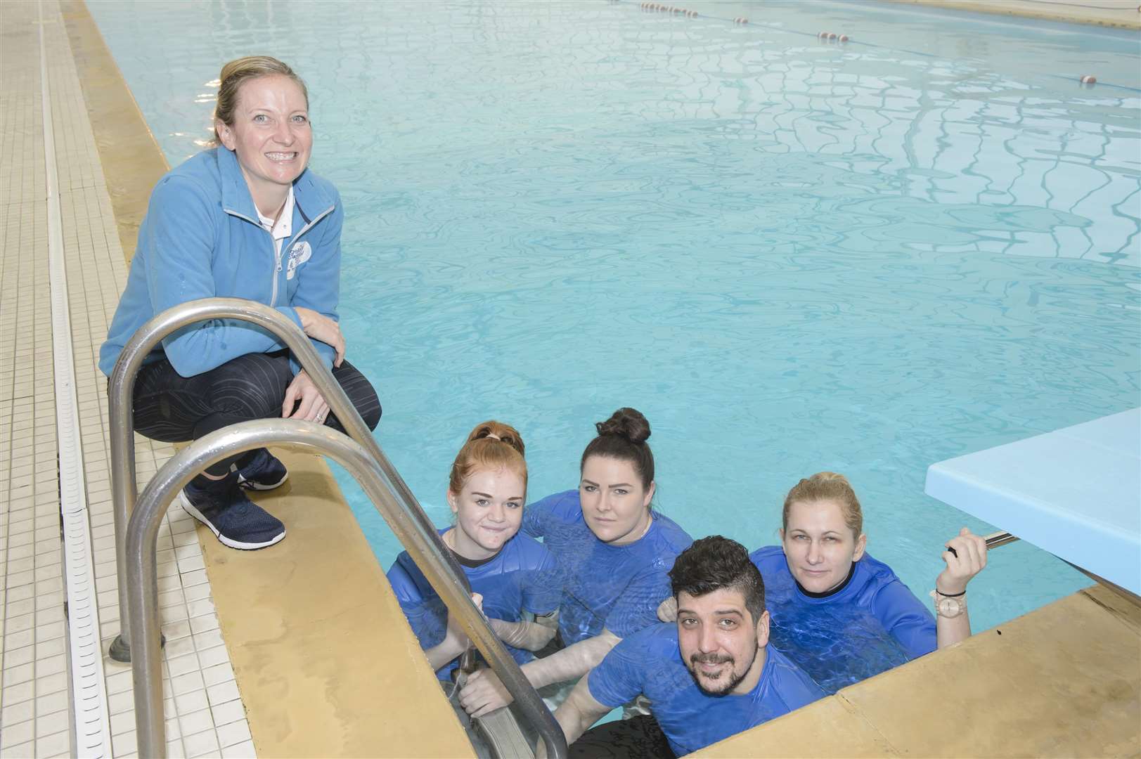 Janice Hutton, with instructors, from left, Hannah Brown Jadie Russell, Peter Gabor and Joanna Borys. Angela’s Swim School at Cobham Hall School, CobhamPicture: Andy Payton 1209384