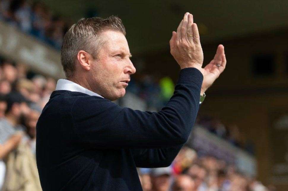 Gillingham manager Neil Harris was proud of his team’s performance at Luton Town in the Carabao Cup