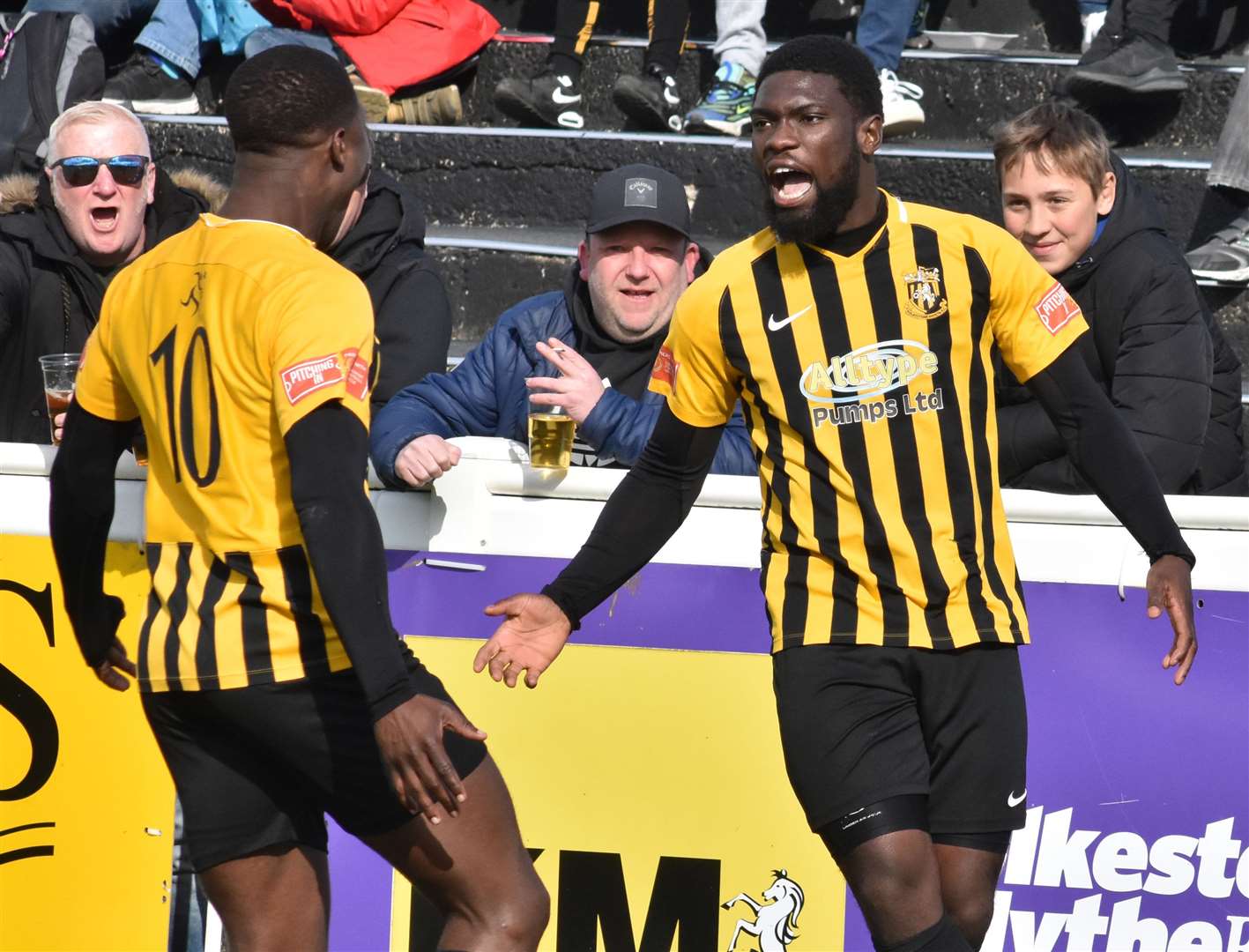 David Smith is congratulated by strike partner Ade Yusuff after scoring in Folkestone's weekend draw with Corinthian-Casuals. Picture: Randolph File